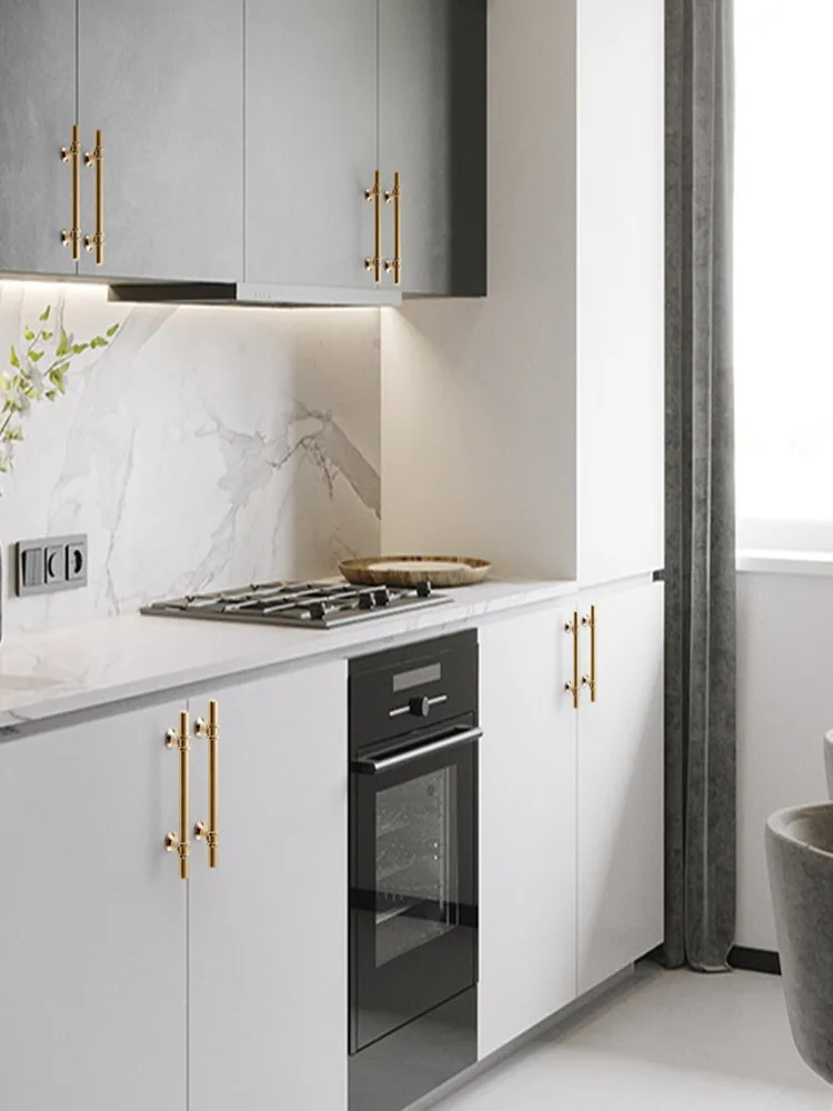white kitchen with gold hardware